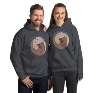 Two smiling people in matching dark heather Made For Each Otter hoodies