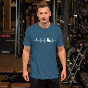 Person in a gym wearing the heather deep teal River Otter Heartbeat T-shirt