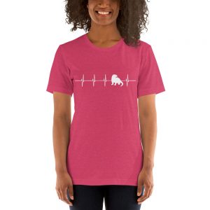 Smiling person wearing the heather raspberry River Otter Heartbeat unisex T-shirt