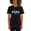 Person wearing the black It's An Otter Thing unisex T-shirt with white script lettering