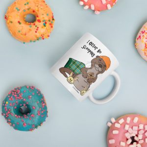 I Otter Be Sleeping Mug-11oz-lifestyle-2 | Otter Things I Otter Be Sleeping mug seen from above among colorful sprinkled donuts