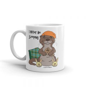 White 11 oz I Otter Be Sleeping mug, handle on the left, with a sleepy otter design