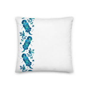 White back of the square Sea Otter Tie-Dye pillow with a strip of blue floating otters