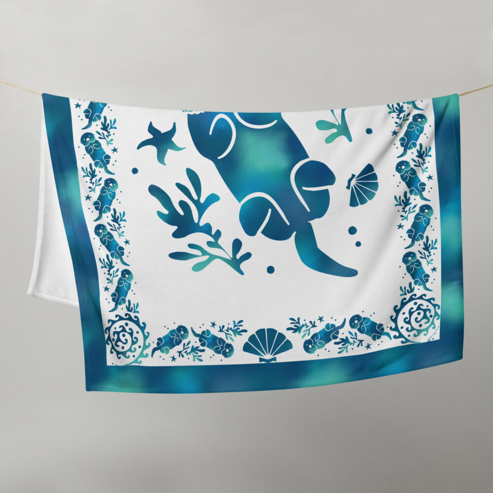 Sea Otter Tie-dye Throw Blanket-50x60-front-2 | Otter Things Sea Otter Tie-Dye throw blanket hanging from a line, blue otter and kelp on white