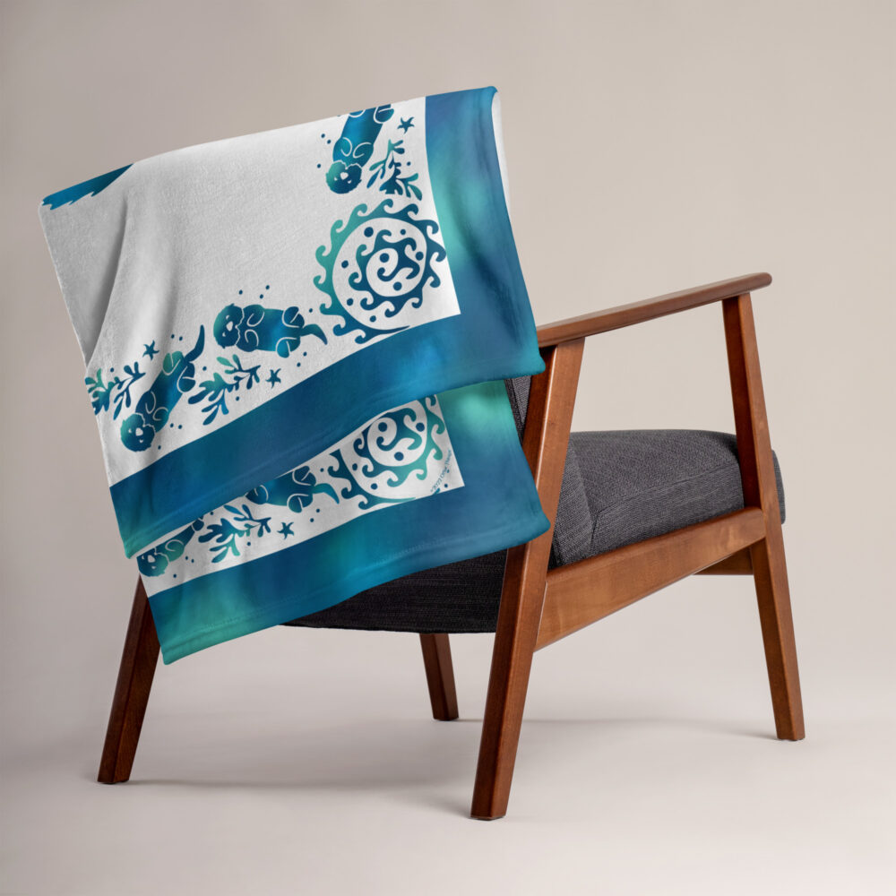 Sea Otter Tie-dye Throw Blanket-50x60-lifestyle | Otter Things Sea Otter Tie-Dye throw blanket draped over the back of a wooden chair