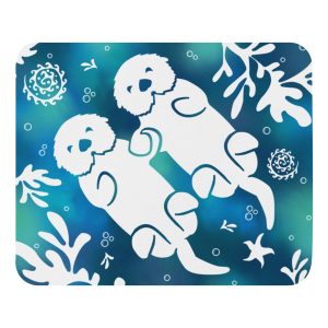 The Sea Otter Tie Dye Mouse Pad features two white otters lying on their backs, holding hands amid abstract aquatic plants and bubbles on a blue and teal background.