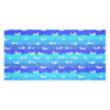 The Ocean Otter Gradient Beach Towel features alternating wavy blue stripes with small white cartoon otters floating on their backs in playful poses across the design.